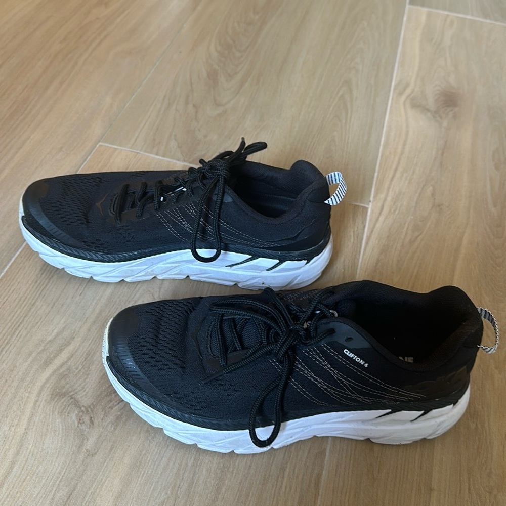 Hoka One One black women’s sneakers